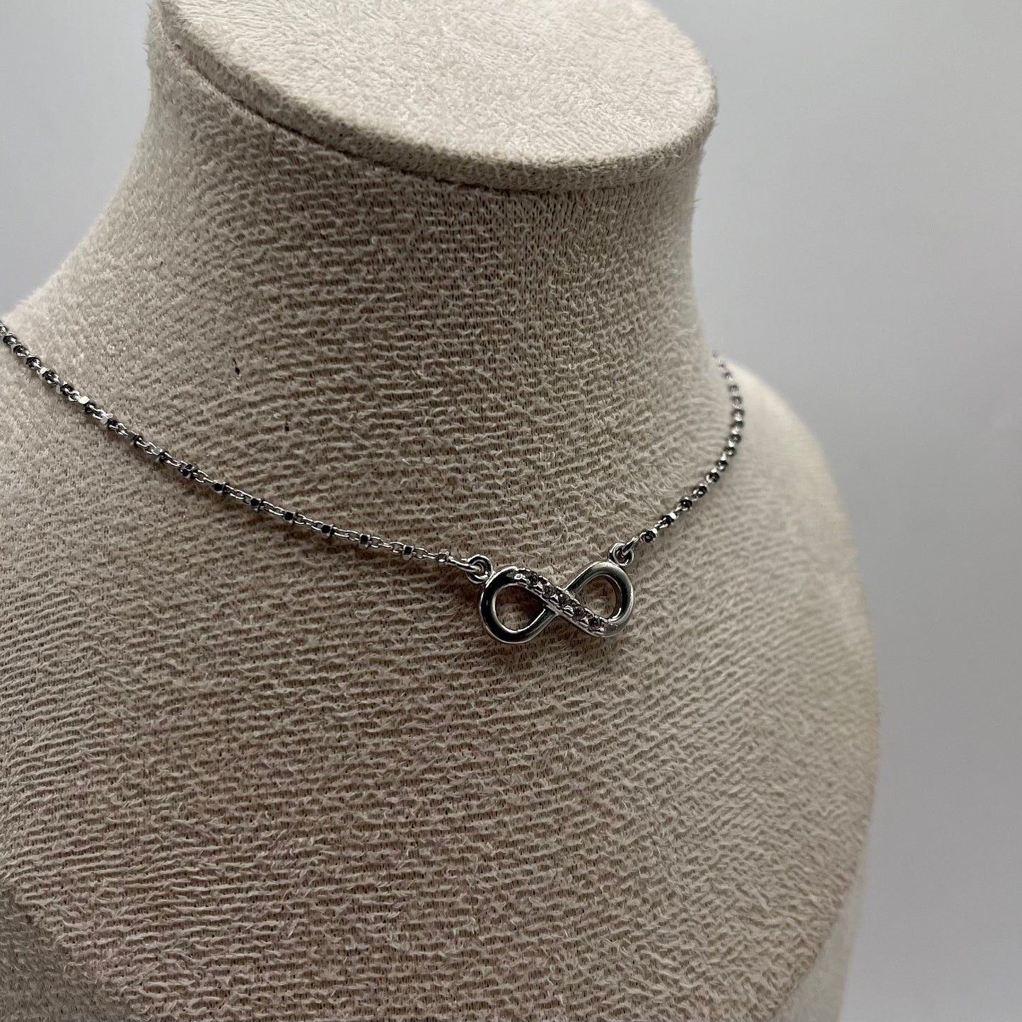 CL SIMBOLO INFINITO ZIRC