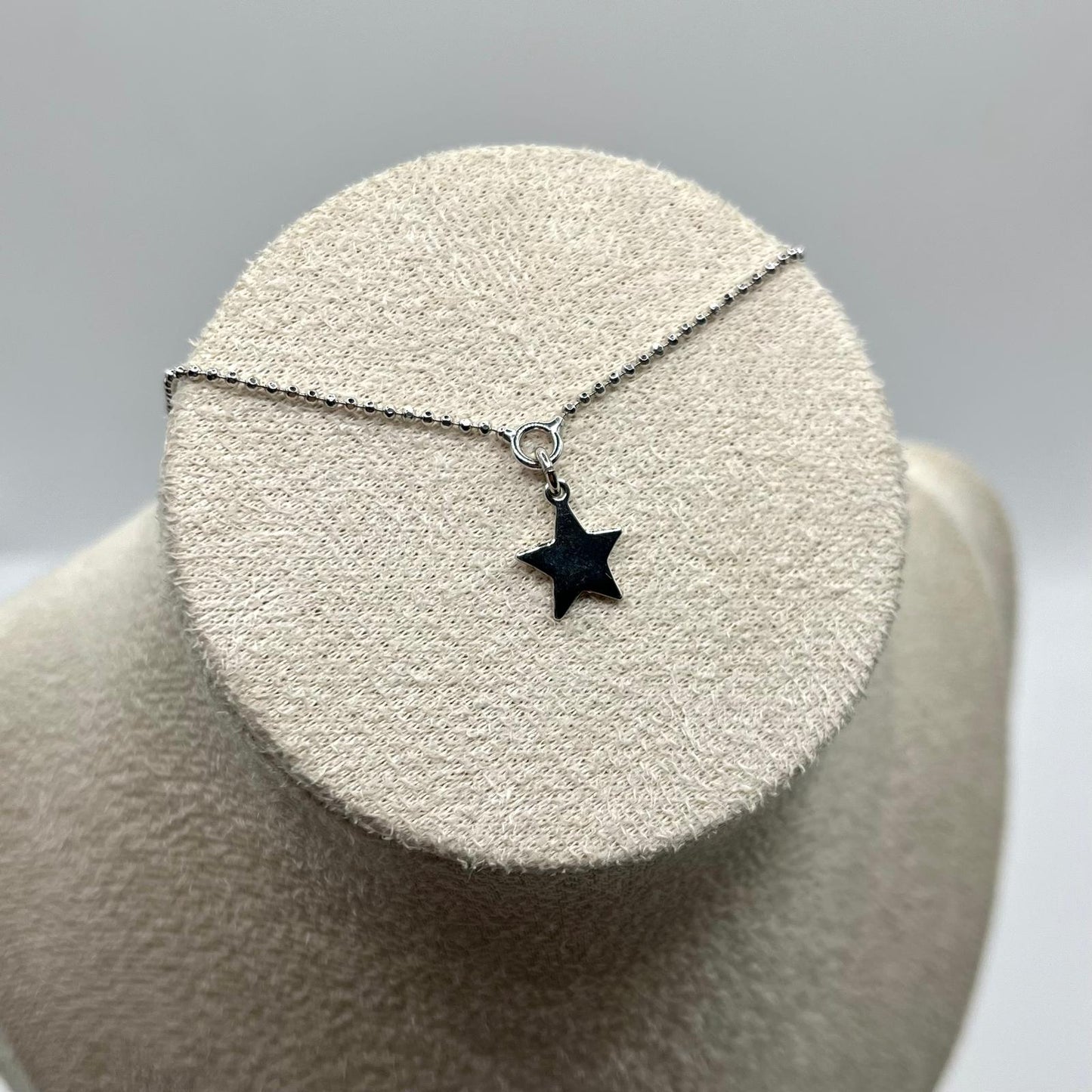 CL CHARM STELLA LISCIO