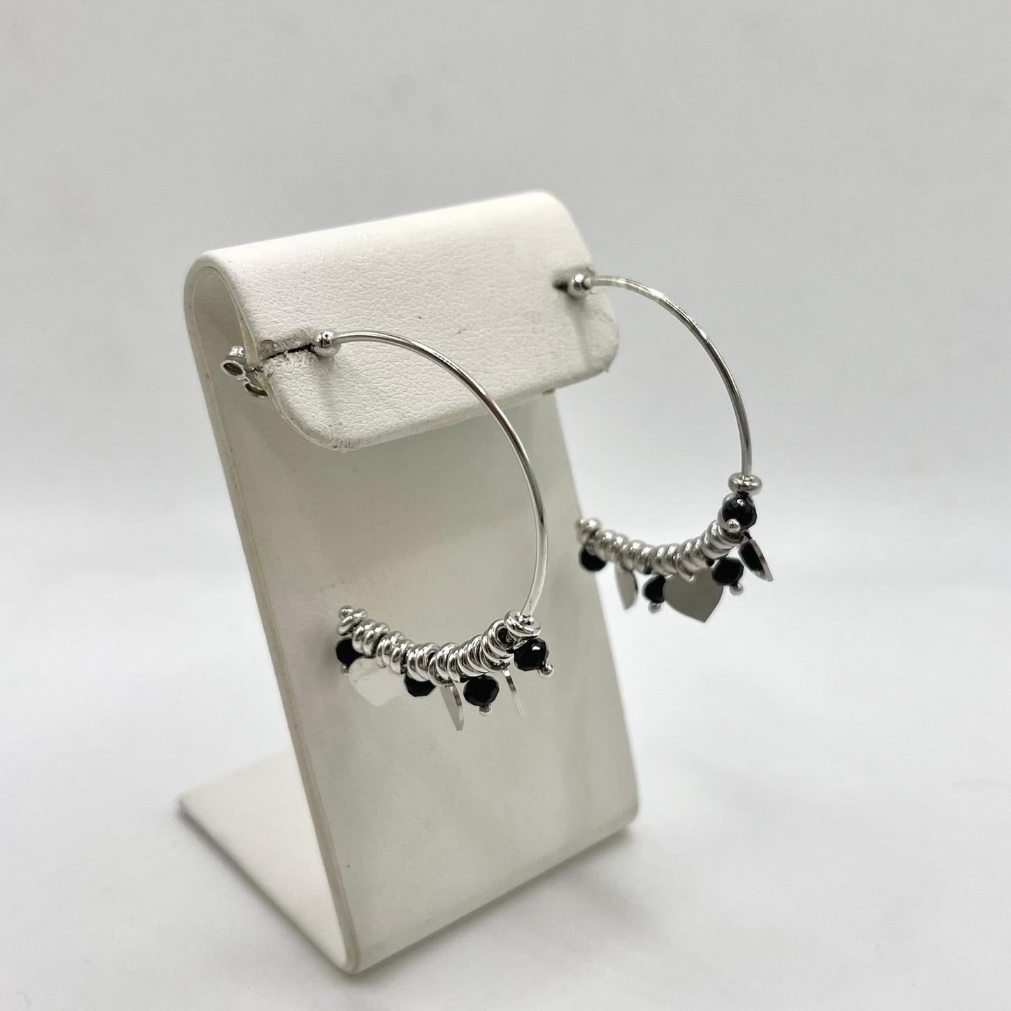 OR CERCHIO PERLINE NERE E CUORI LISCI