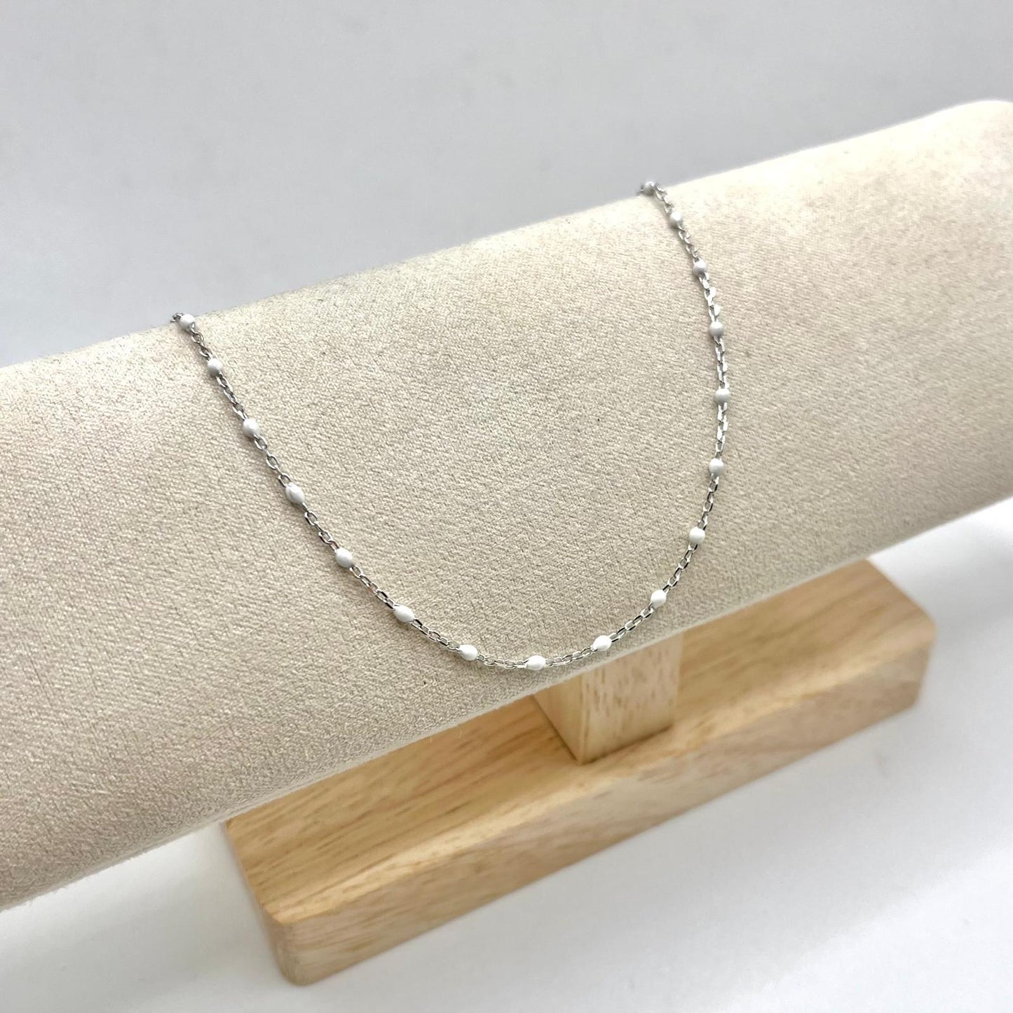 WHITE BEAD ANKLETS