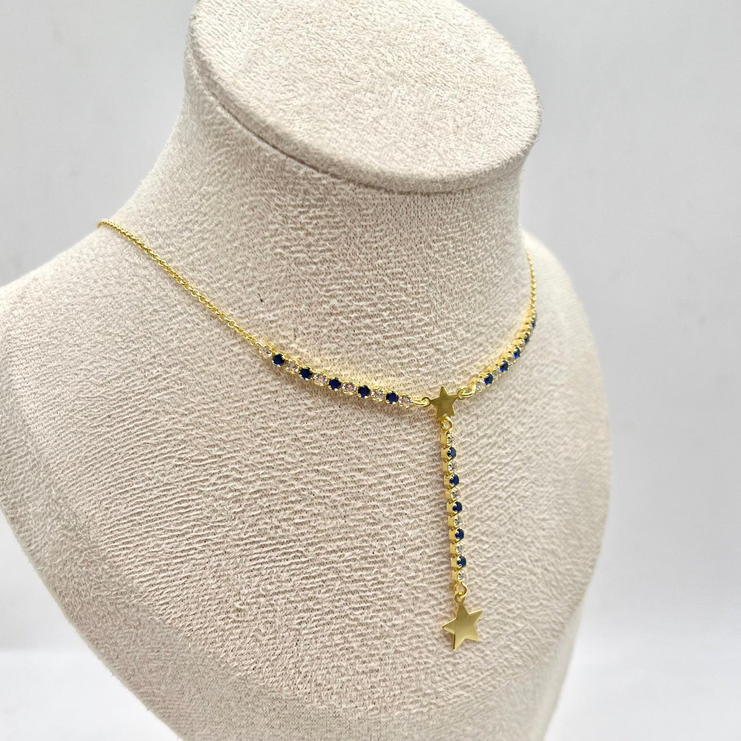 CL ZIRCONI BIANCHI E BLU CON STELLA