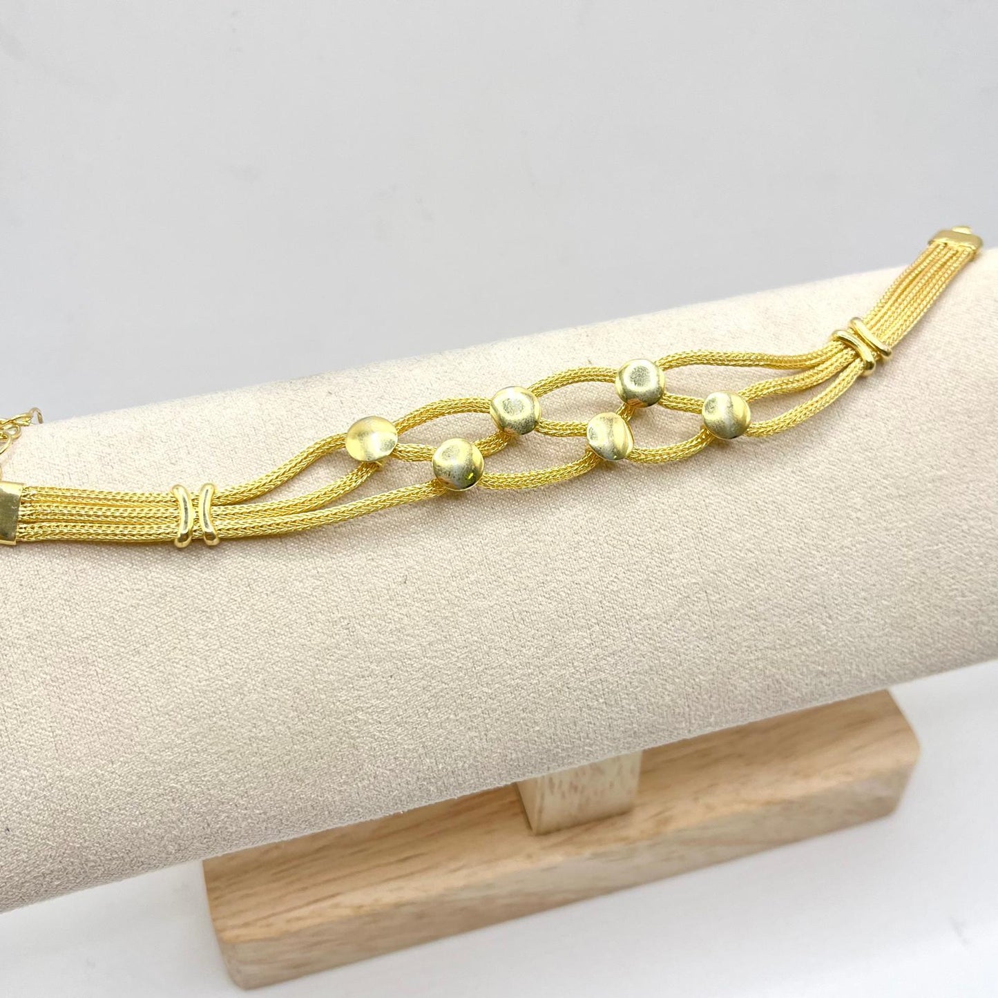 BR INTRECCIO CON ELEMENTI TONDI