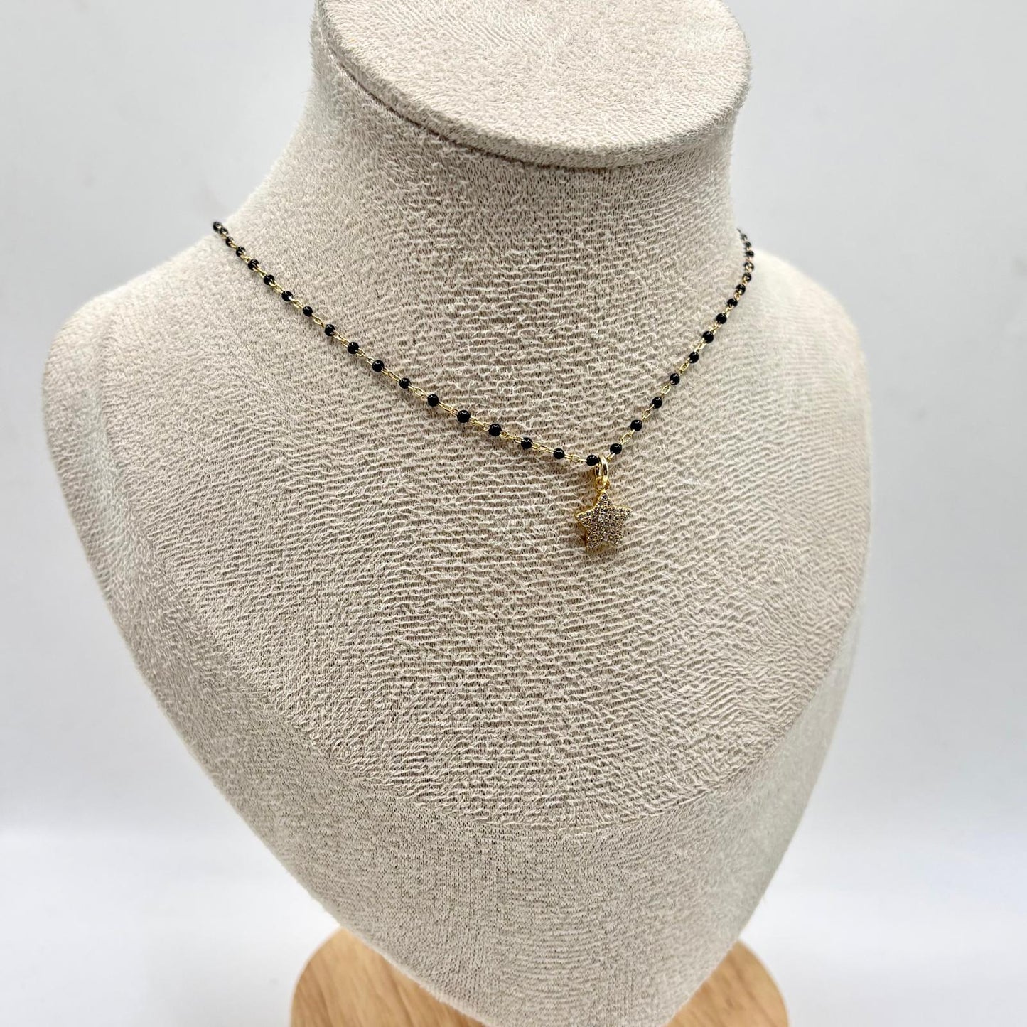 CL PERLINE NERE E STELLA ZIRCONI