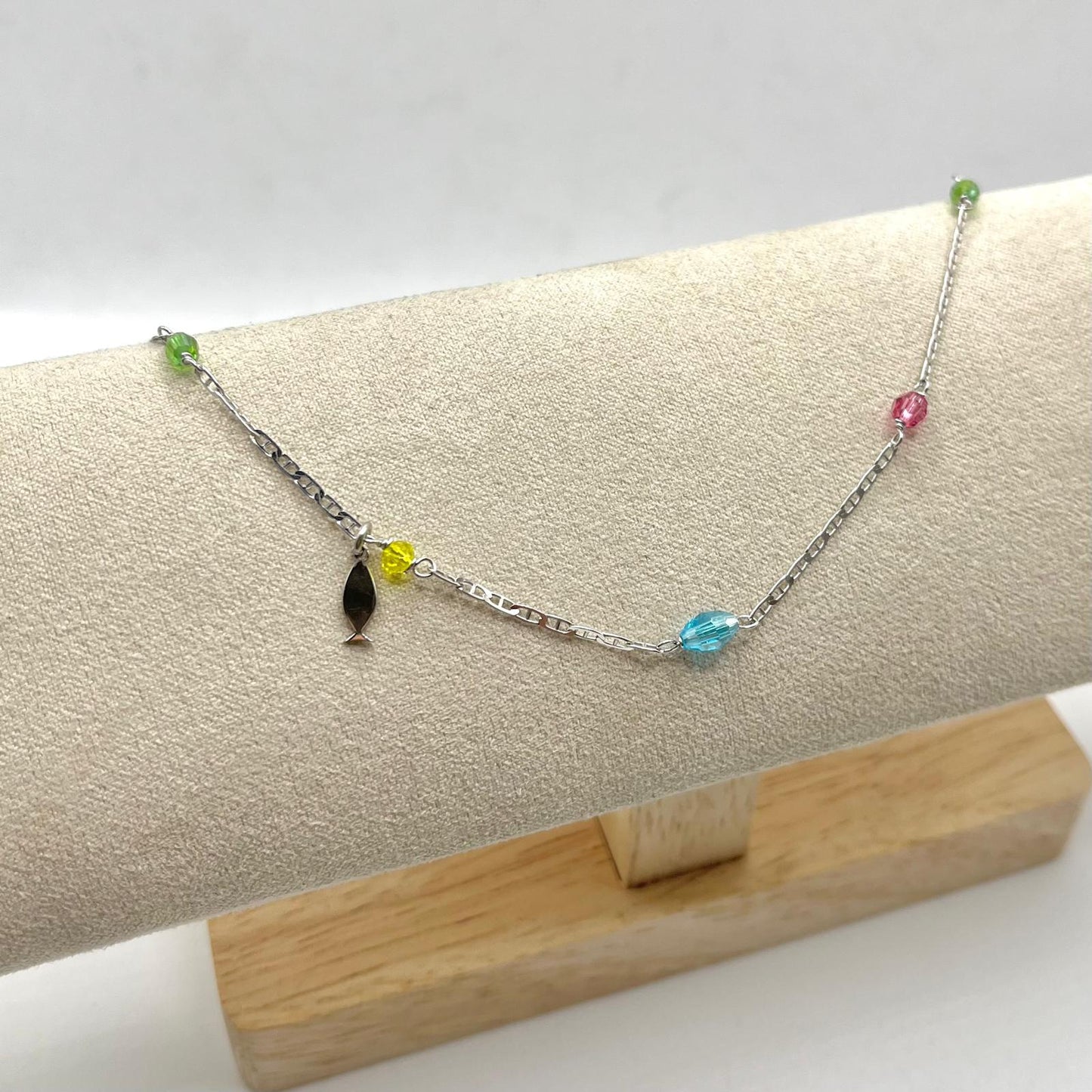 CAVIGLIERA CON ELEMENTI E CHARM PEDNENTE