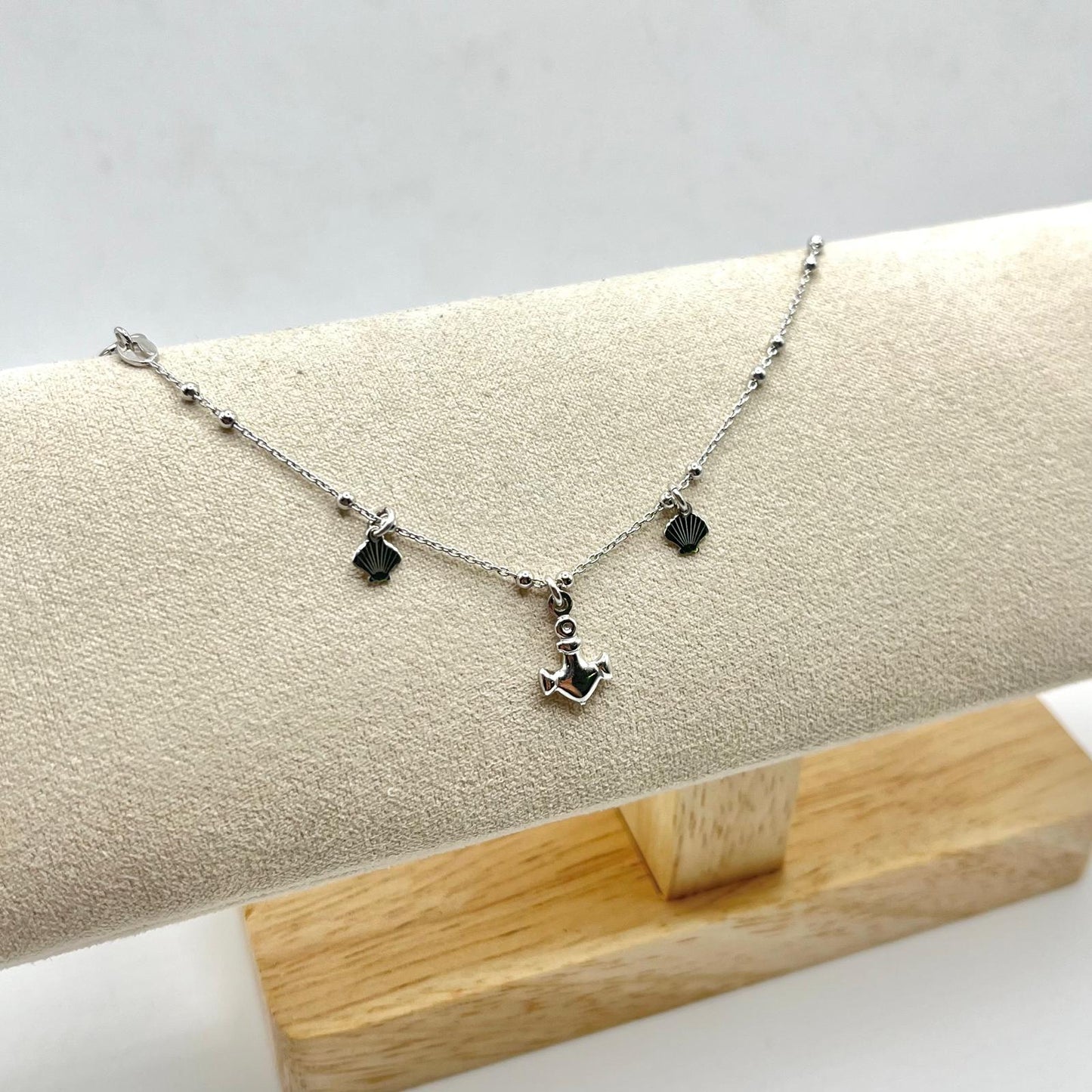 CAVIGLIERA CON ANCORA