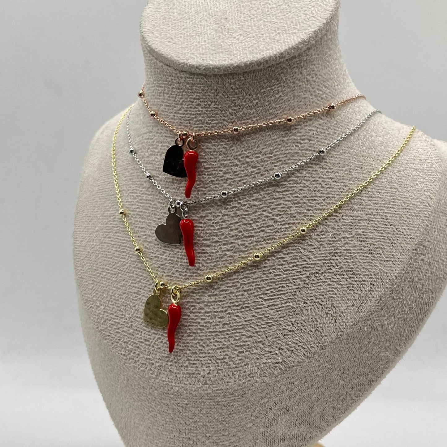 CL PALLINE CORNO E CHARM CUORE