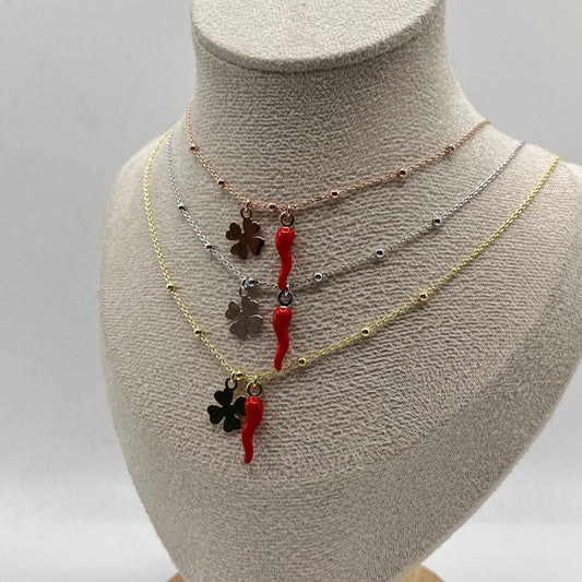 CL PALLINE CORNO E CHARM QUADRIFOGLIO