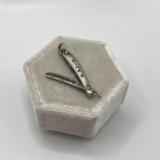 CIONDOLO OSSIDATO COLTELLO SVIZZ