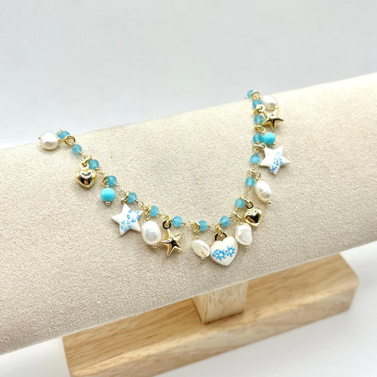 BR PERLE ELEM SMALTATI E CHARMS