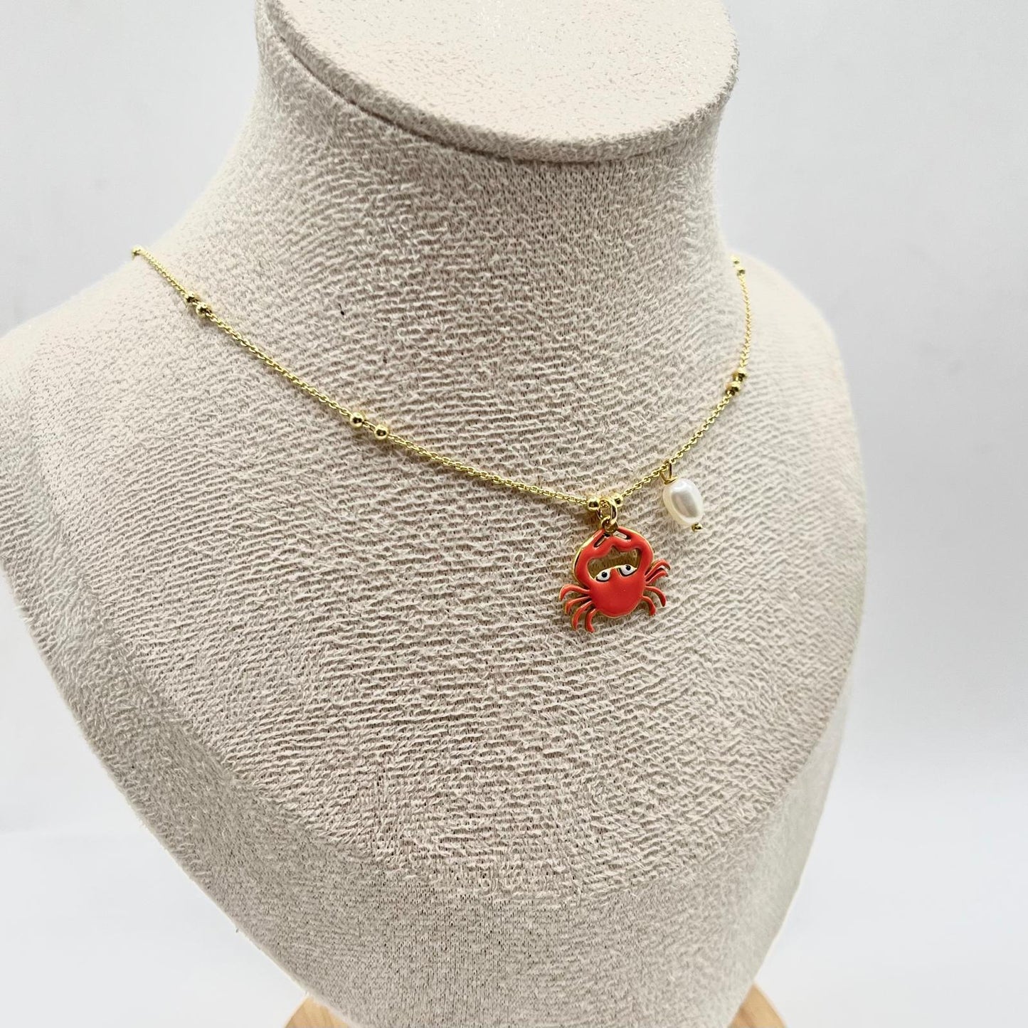 CL CHARM PERLA E GRANCHIO