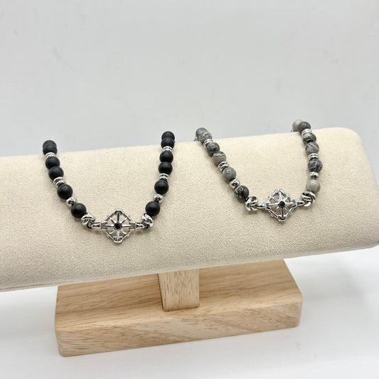 BR ACCIAIO PALLINE E ROSA DEI VENTI