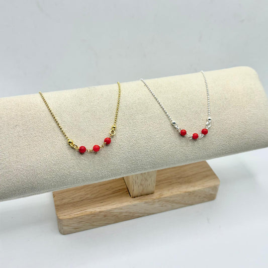 BR BIMBO/A PALL DIAM CON 3 PALL CORALLO