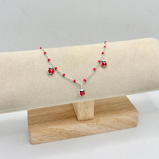 BR BIMBA PERLINE ROSSE E COCCINELLE PENDENTI