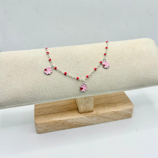 BR PERLINE ROSSE E QUADRIFOGLI CON COCCINELLA PENDENTI
