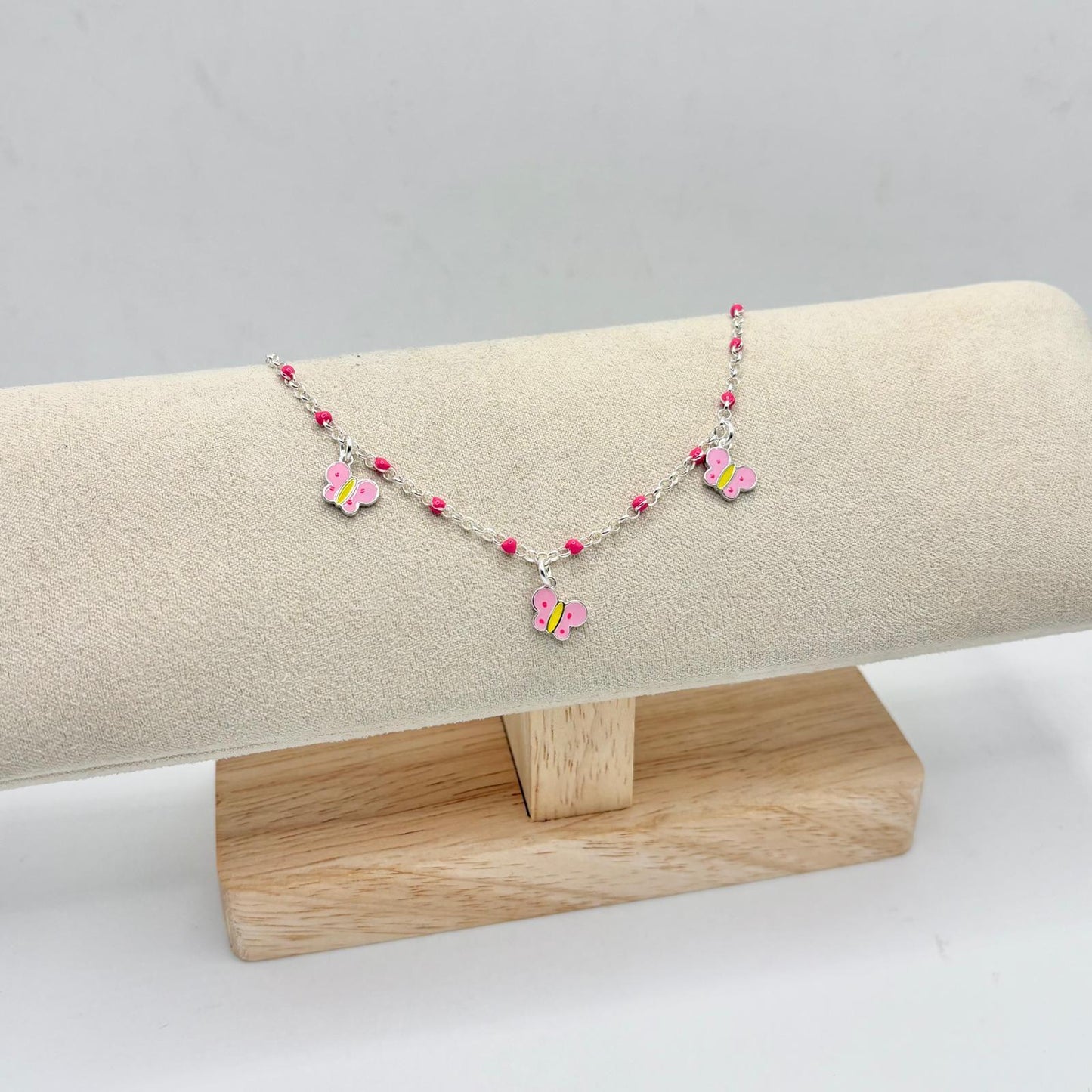 BR BIMBA PERLINE ROSA E FARFALLE SMALTO
