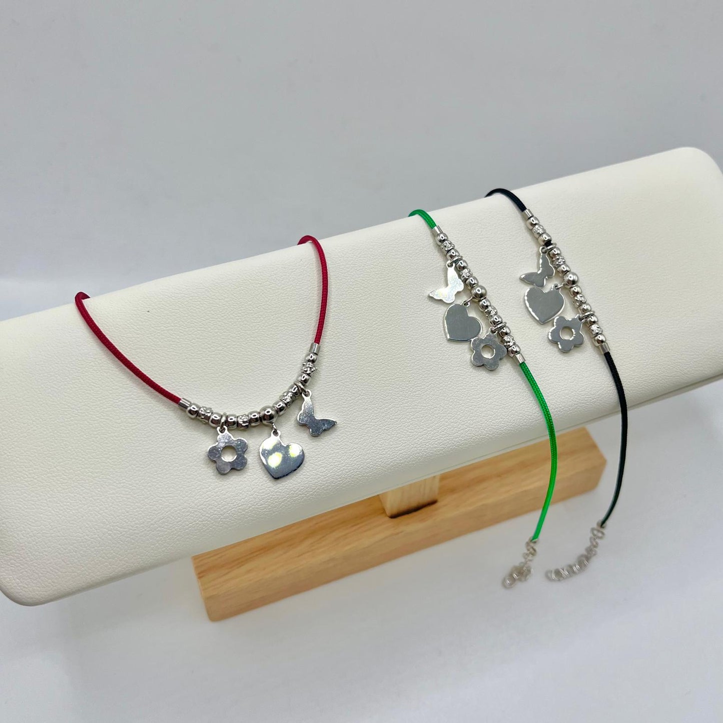 BR CORDINO CON PEPITE E CHARM PENDENTI