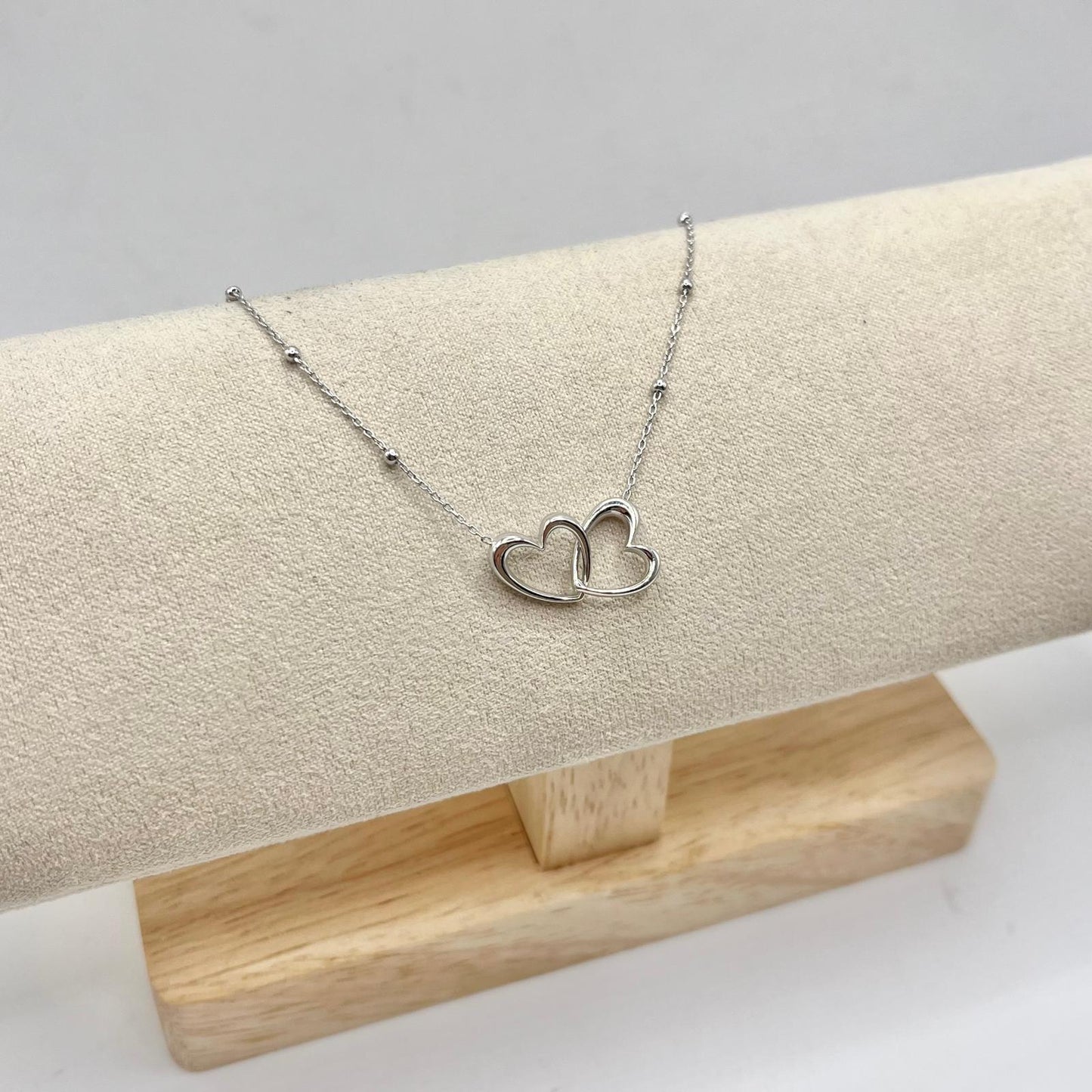 BR DOPPIO CUORE INTRECCIATO