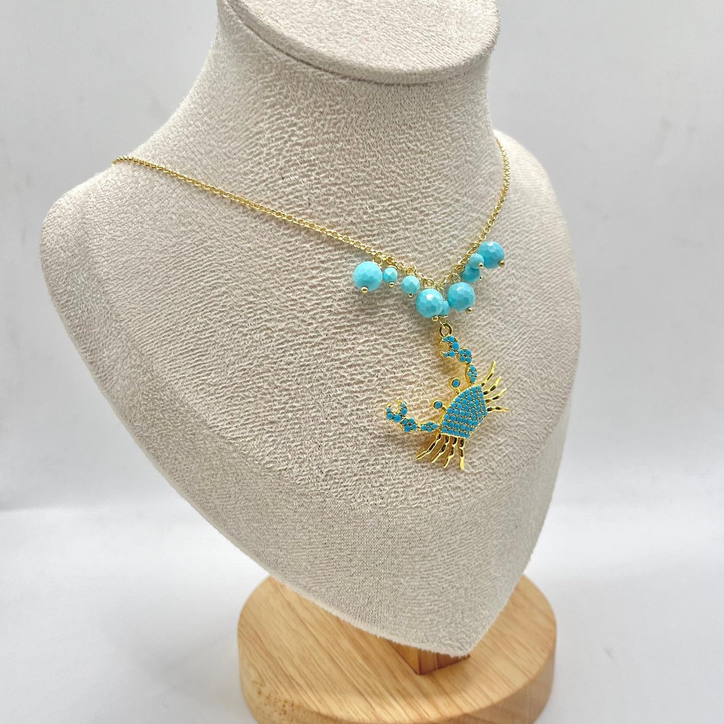 CL PERLINE AZZURRE E GRANCHIO