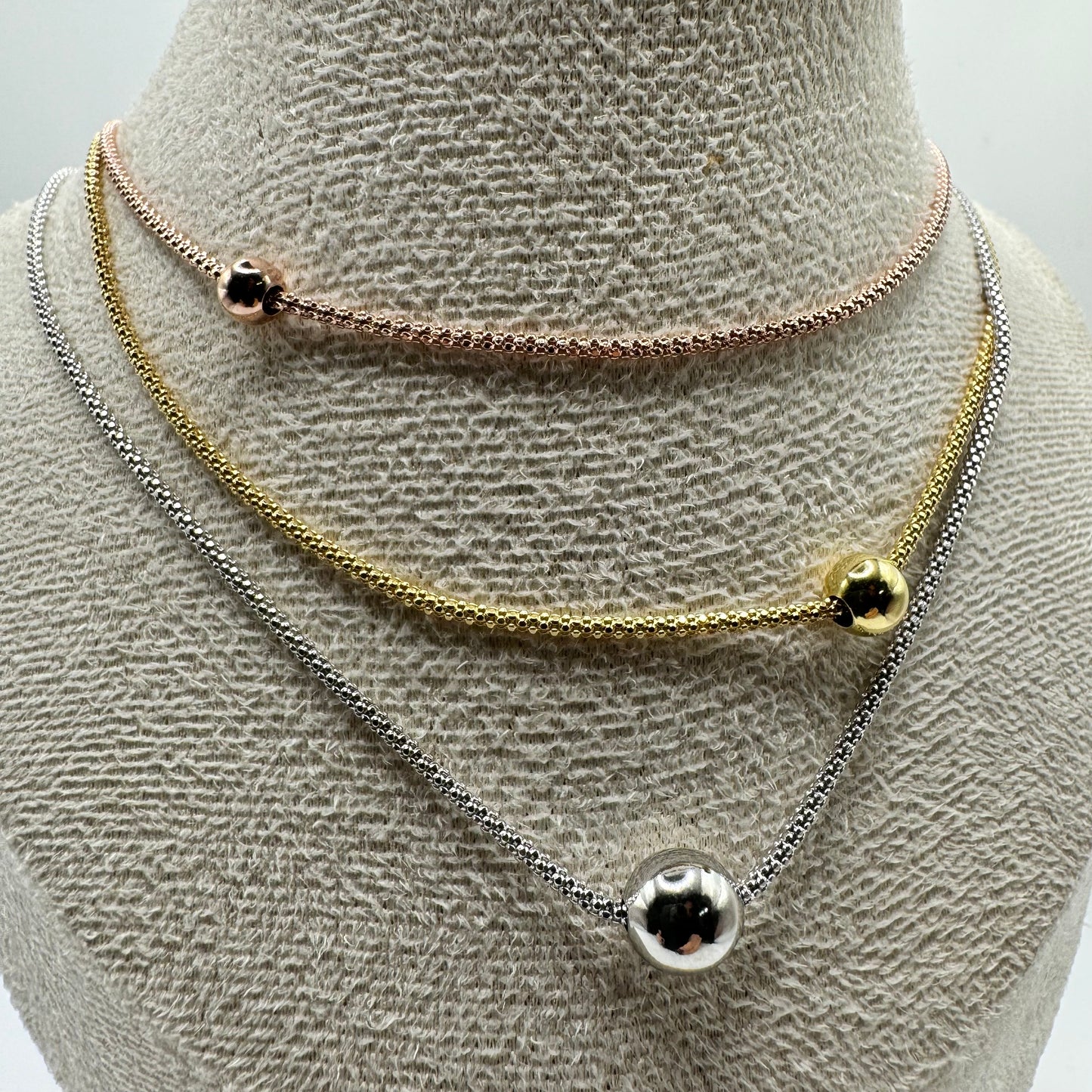 CL 3 FILI MAGLIA COREANA CON PALLINE CENTRALI