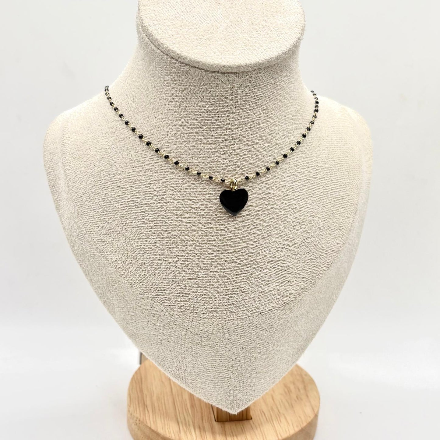 CL PERLINE NERE E CUORE SMALTO NERO