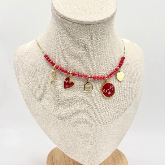 CL PERLINE ROSSE E CHARMS MISTI