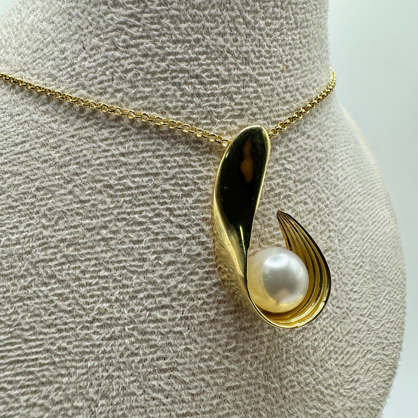 CL CON ELEMENTO CURVO E PERLA