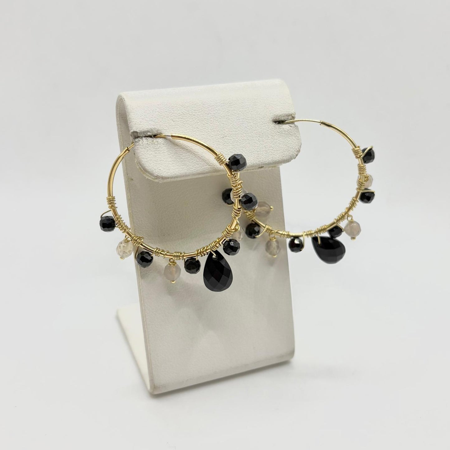 COR CERCHIO 3,1 CM PIETRE NERE PENDENTI